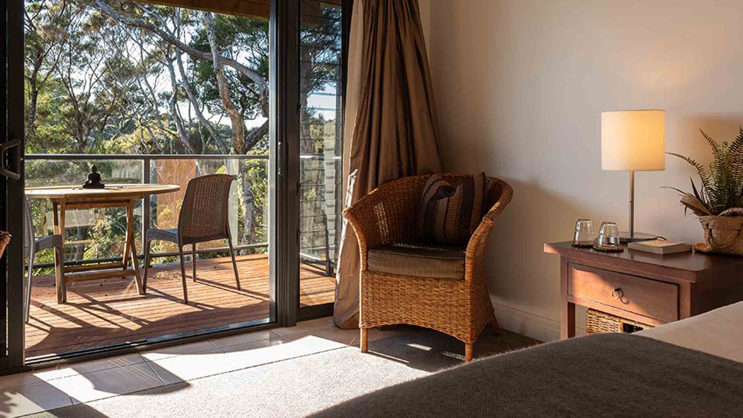 the-sanctuary-bay-of-islands-new-zealand-bedroom-out-to-deck