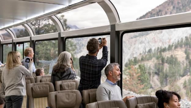 rocky-mountaineer-rail-canadian-rockies-silverleaf-service-interior-guests-socialising