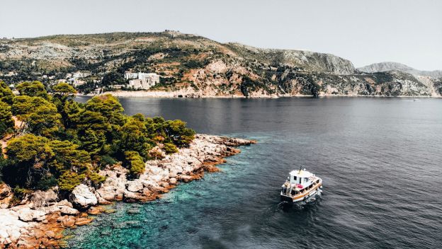 croatia-beach-with-boat-on-canal