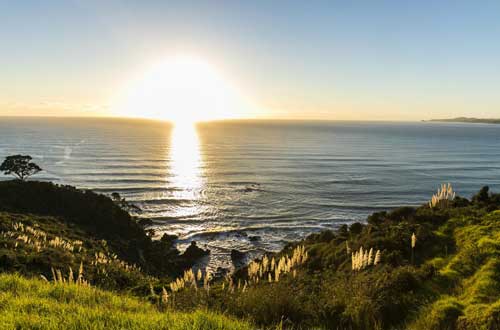 the-lodge-at-kauri-cliffs-bay-of-islands-new-zealand-sunset