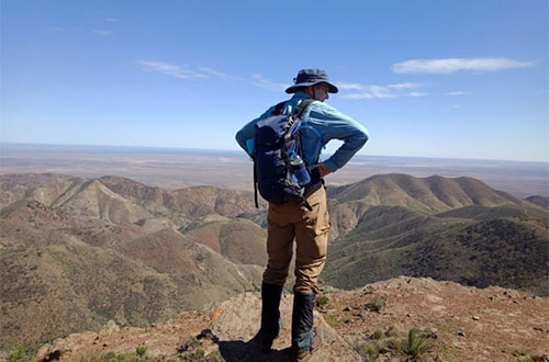 dutchman-stern-man-overlooking-mountains