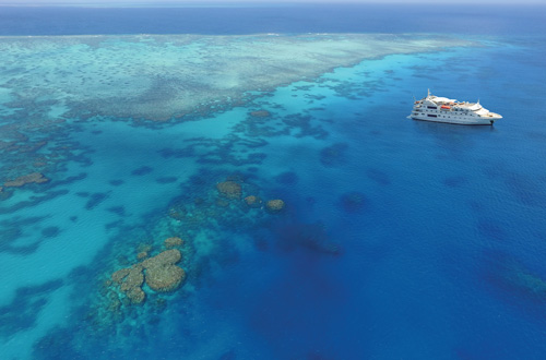 great-barrier-reef-cruise-australia-queensland-coral-discoverer-at-reef