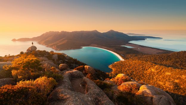 freycinet-peninsula-naitonal-park-east-coast-tasmania-australia-wineglass-bay-beach-hiker-on-the-top-panoramic-view